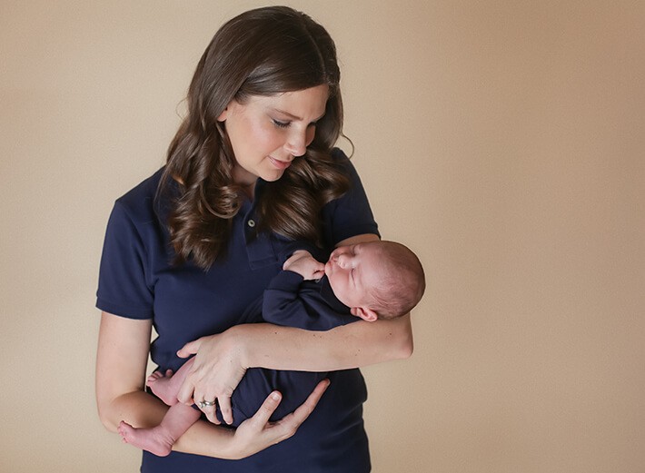 Mom holding baby boy