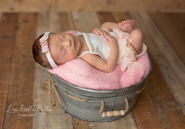 Baby girl in bucket